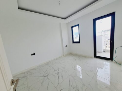 Unfurnished 1+1 apartment (64 m²) on the 5th floor in